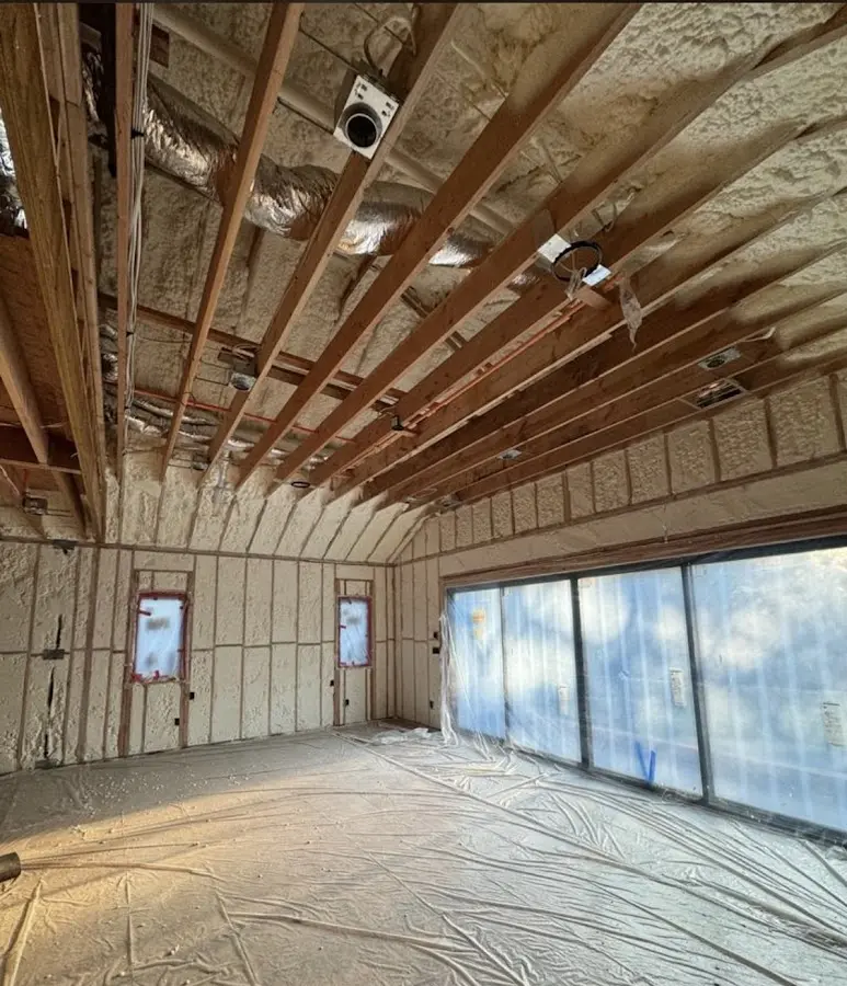 Interior walls and ceiling insulated with spray foam during new construction in Worth